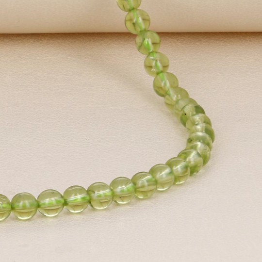 Smooth Spherical Peridot Thread