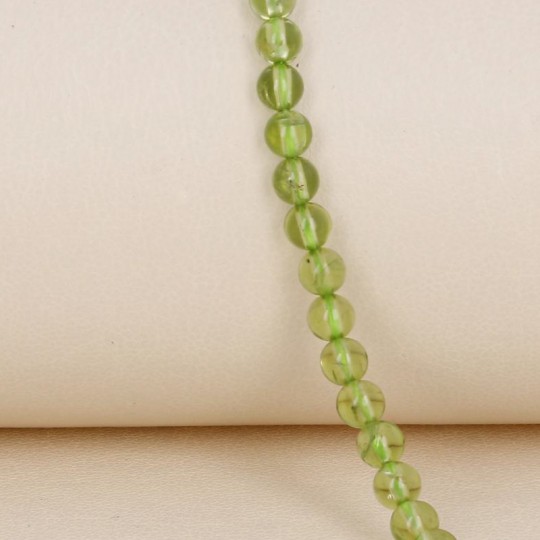 Smooth Spherical Peridot Thread