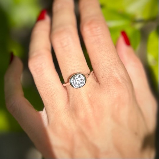 Ring with Moissanite Synthetic Bearing Square