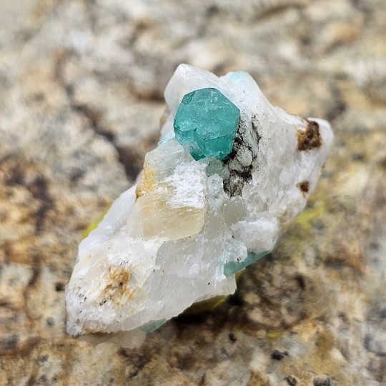 Emerald Stone on Calcite